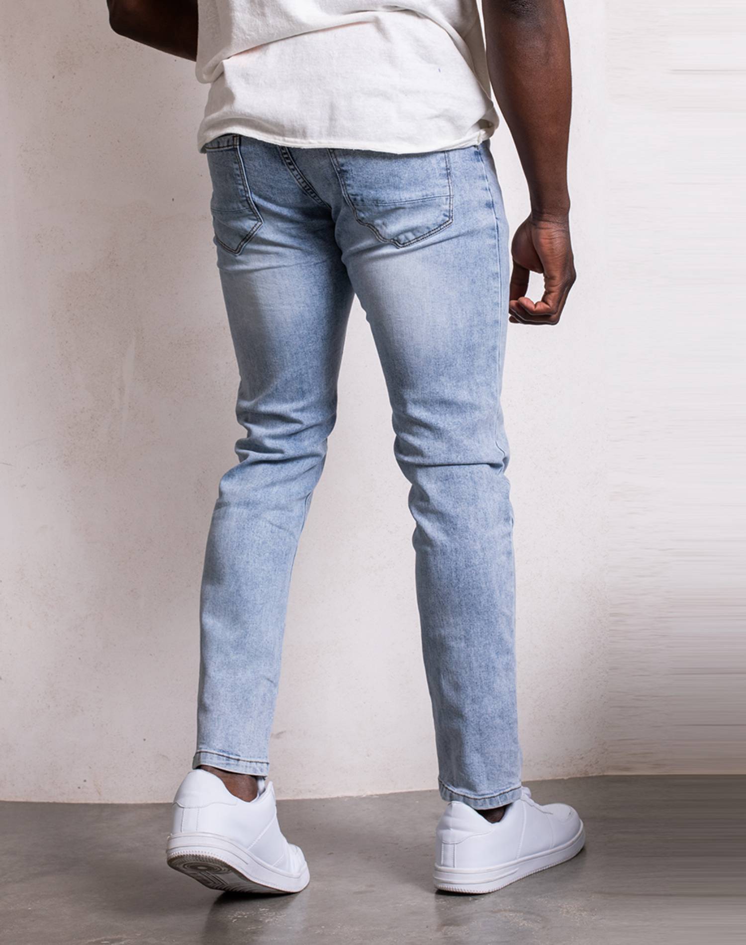 Vaquero slim fit con cadena para hombre
