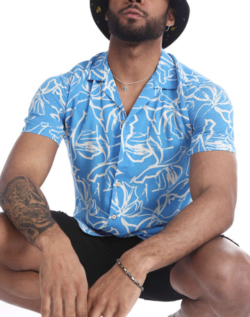 Camisa hawaiana flor blanca