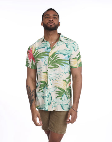 Camisa hawaiana verde con hojas azules