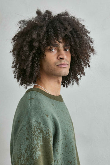 Jersey oversize de hombre verde con dibujo abstracto