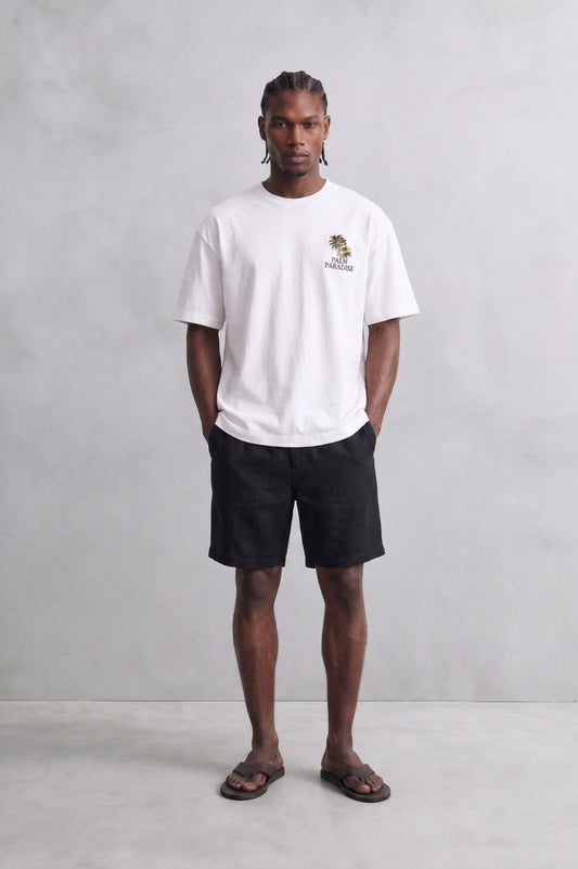 Camiseta oversize blanca Palm Paradise, vista de cuerpo entero.