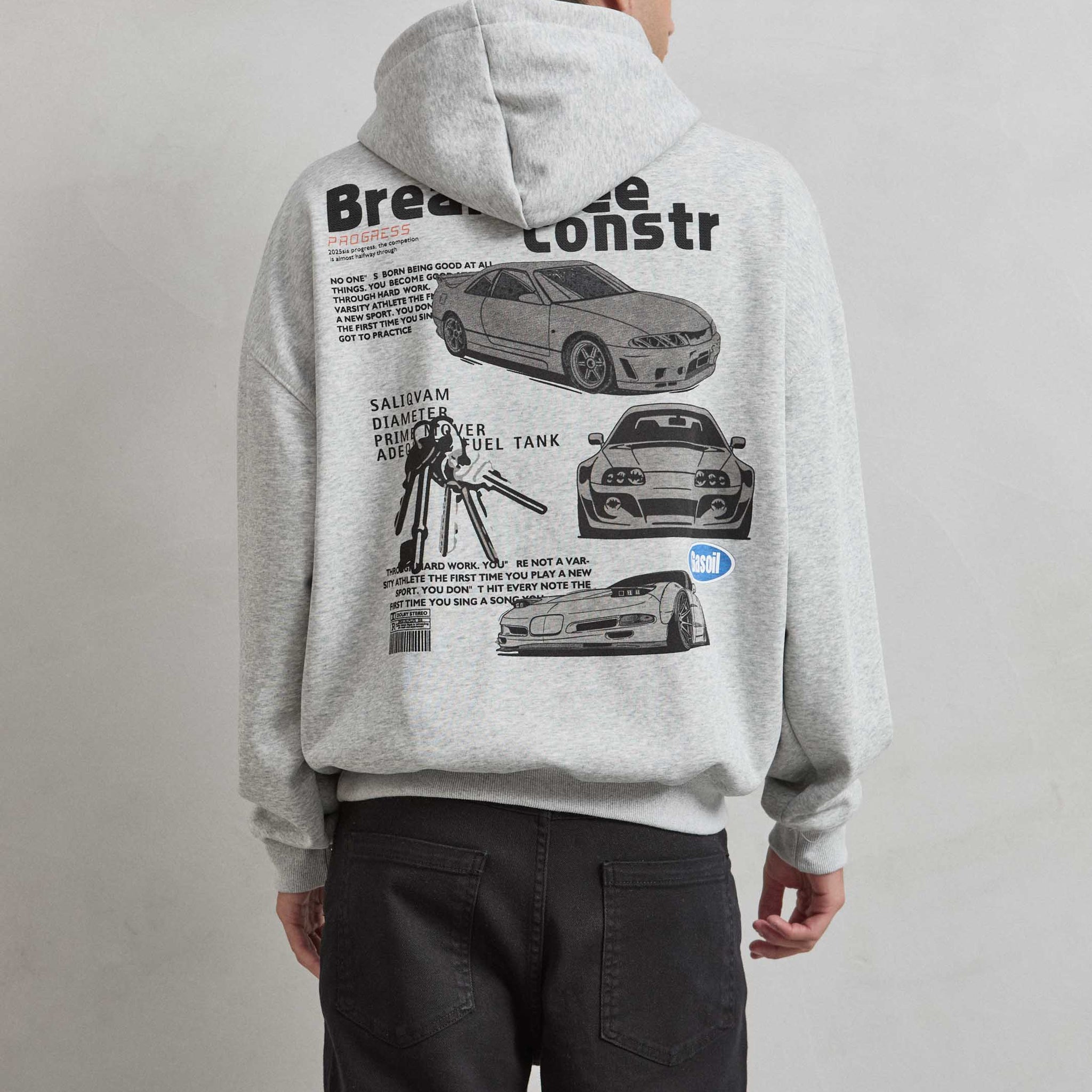 Sudadera gris jaspe con autos noventeros y texto BREAK FREEE CONSTR en la espalda