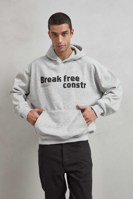 Sudadera gris jaspe con frase BREAK FREEE CONSTR en el frente