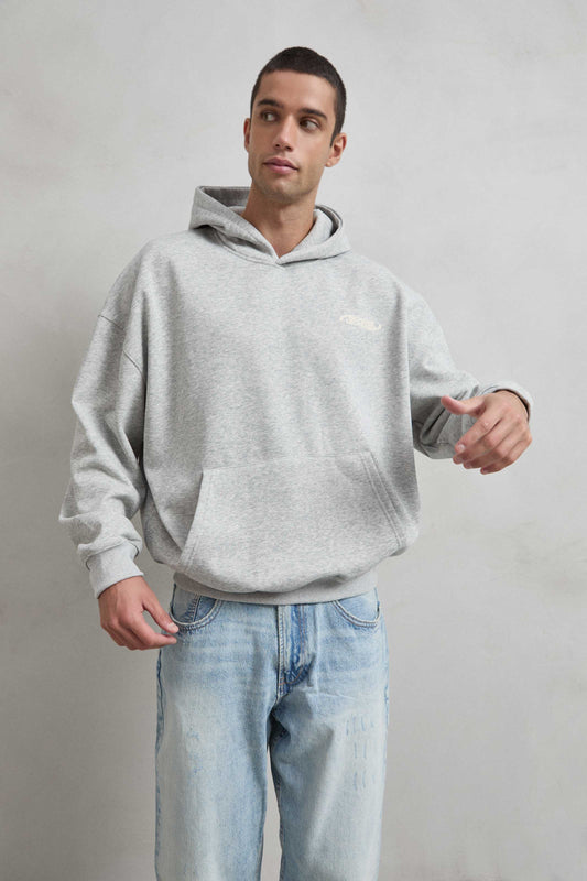 Sudadera gris jaspe con estampado delantero INCREASE / DECREASES en serigrafía