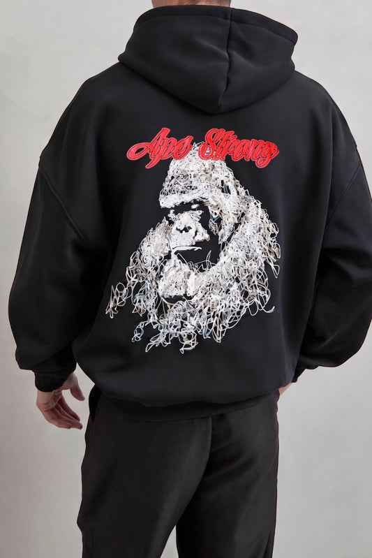 Espalda de sudadera negra con gráfico de gorila en blanco y letras rojas Ape Strong