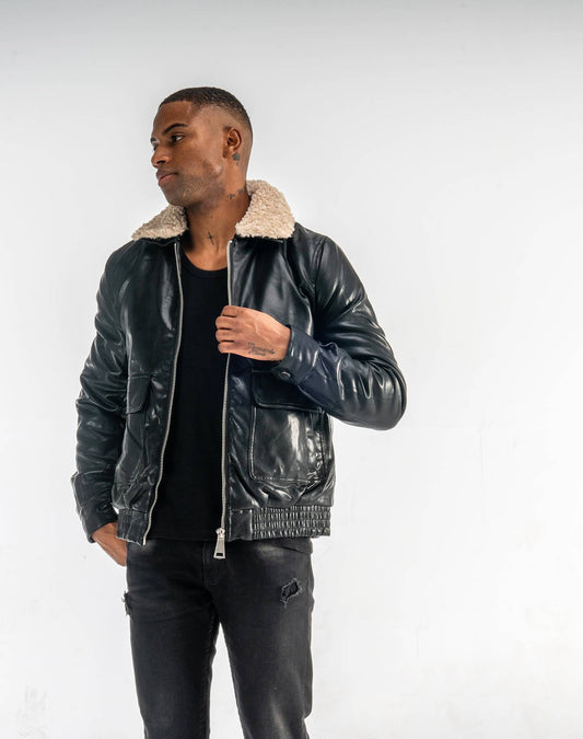 Chaqueta polipiel estilo aviador con borrego en el cuelloAbrigos / ChaquetasNegroS